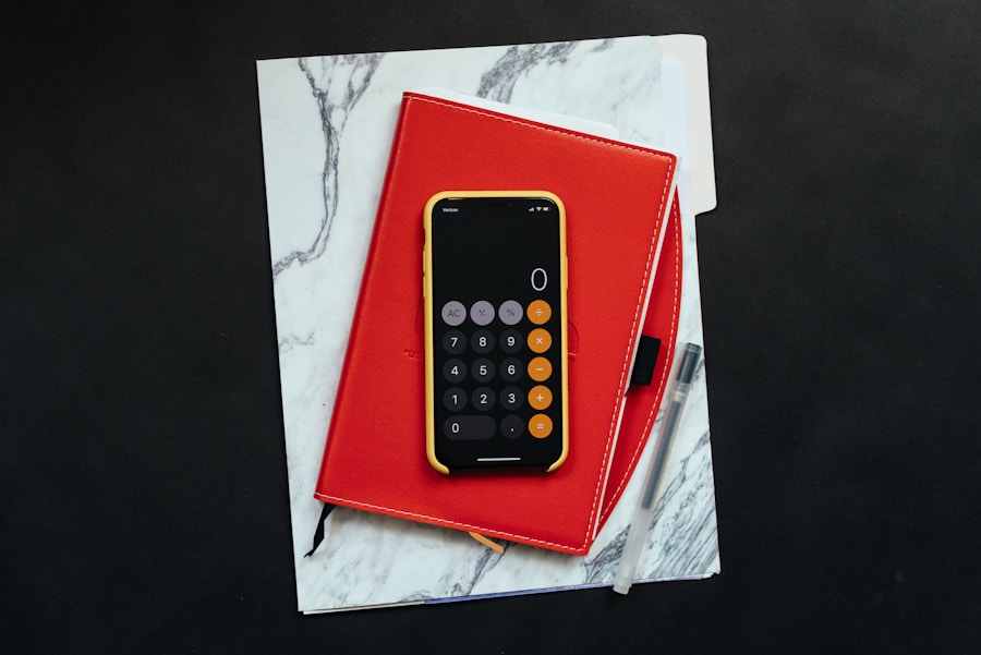 black Android smartphone on red flip case